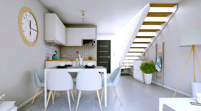 widok od strony kuchni na 2-poziomowe wnętrze luksusowego apartamentu do sprzedaży nad morzem