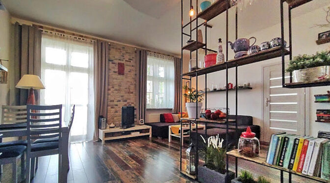 nowoczesna aranżacja salonu w ekskluzywnym apartamencie na sprzedaż Legnica
